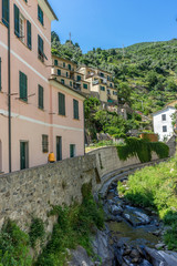 Fototapeta na wymiar Italy, Cinque Terre, Vernazza, a castle on the side of a building