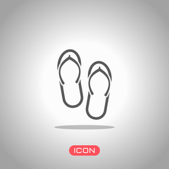 Beach slippers. Flip flops icon. Icon under spotlight. Gray background