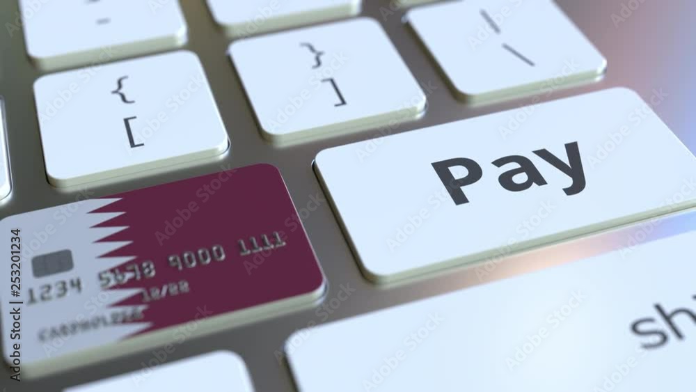 Poster bank card featuring flag of qatar as a key on a computer keyboard. qatari online payment conceptual 