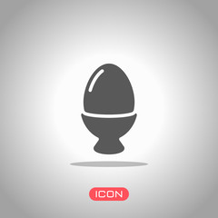 Boiled egg, icon of food. Icon under spotlight. Gray background
