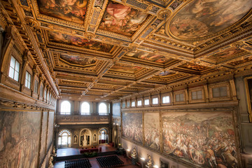 Interior with fresco and golden ceiling of the 14th century Palazzo Vecchio