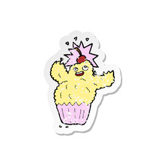 retro distressed sticker of a cartoon cupcake monster