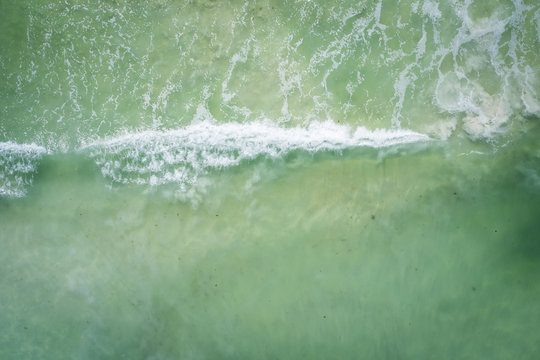 Waves birds eye view tropical water