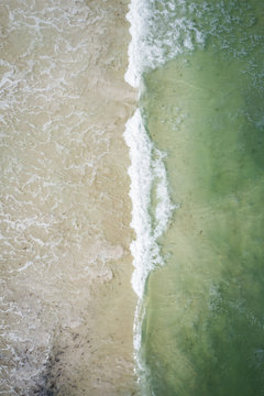 Aerial Drone waves crashing on beach