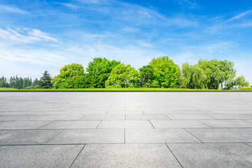 Empty square floor and green forest in summer season