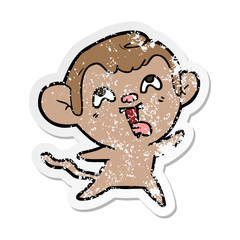 Fototapeta premium distressed sticker of a crazy cartoon monkey