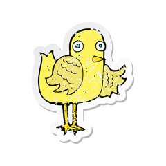 retro distressed sticker of a cartoon bird waving wing