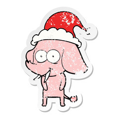 happy distressed sticker cartoon of a elephant wearing santa hat