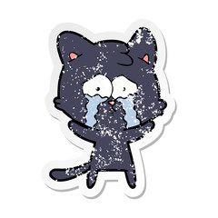 distressed sticker of a cartoon crying cat