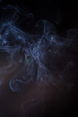 Smoke on a black background.