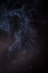 Smoke on a black background.