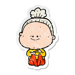 distressed sticker of a cartoon happy old woman