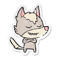 distressed sticker of a friendly cartoon wolf