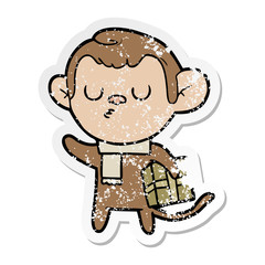 distressed sticker of a cartoon calm monkey