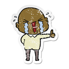 distressed sticker of a cartoon crying bald man