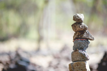 The stones that are laid against each other are like unity and teamwork.Team concept With copy space