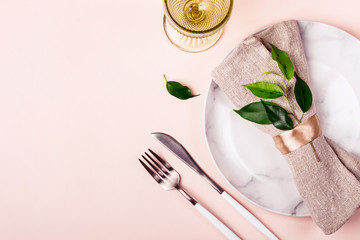Wedding or festive table setting in natural style. Minimalistic arrangement