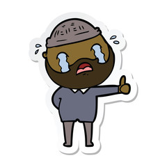 sticker of a cartoon bearded man crying