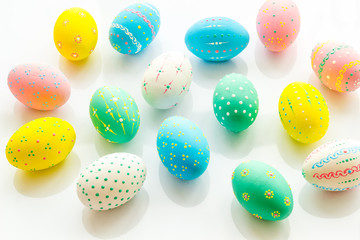 Colorful Easter eggs background on white background