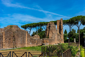 Fototapeta na wymiar The ancient ruins at the Roman Forum in Rome. Famous world landmark