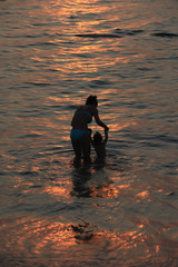 silhouette of a person in the sunset