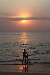 Fototapeta premium silhouette of a person in the sunset
