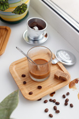 Alternative coffee brewing, fasian filter for making espresso with sugar milk, morning hipster relaxation background