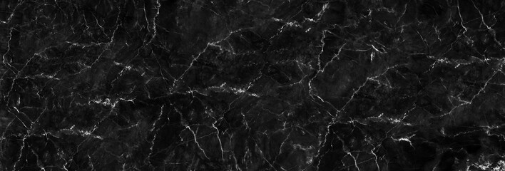 Obraz na płótnie Canvas Natural black marble texture for skin tile wallpaper luxurious background, for design art work. Stone ceramic art wall interiors backdrop design. Marble with high resolution