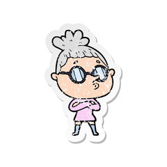 distressed sticker of a cartoon woman wearing glasses