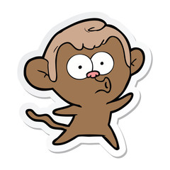 sticker of a cartoon surprised monkey