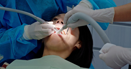 Woman undergo dental care at clinic