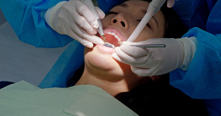Asian Woman have dental check up