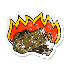 distressed sticker of a quirky hand drawn cartoon burning log