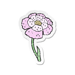 retro distressed sticker of a cartoon flower