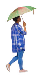 back view of a dark-skinned girl in a shirt walking under an umbrella.