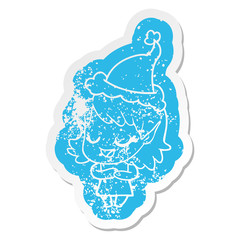 happy cartoon distressed sticker of a elf girl wearing santa hat