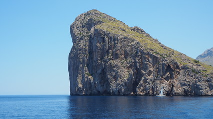 Fototapeta premium Views of the sea and the mountains while sailing with the ship between the Port of Sa Calobra and the port of Soller