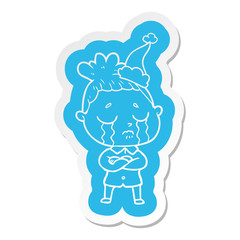 cartoon  sticker of a crying woman wearing santa hat
