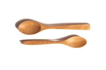Wooden spoon isolated on white background