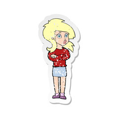 retro distressed sticker of a cartoon woman with folded arms