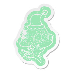 cartoon distressed sticker of a unsure elephant running away wearing santa hat