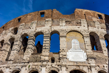 Facade of the Great Roman Colosseum (Coliseum, Colosseo), also known as the Flavian Amphitheatre. Famous world landmark