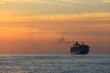 cargo ship at sunset