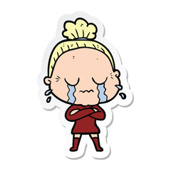Obraz premium sticker of a cartoon crying old lady