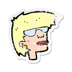 retro distressed sticker of a cartoon female face with glasses