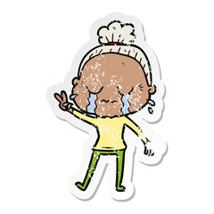 distressed sticker of a cartoon crying old lady