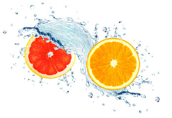 orange and grapefruit splashing water isolated on white