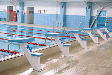 Naklejka premium Pool. Water in the pool. A place for swimming. Rest on the water. Ladder in the Pool.