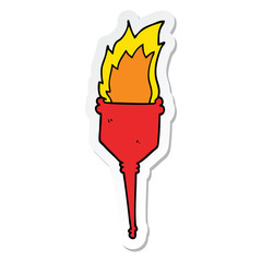 sticker of a cartoon flaming torch