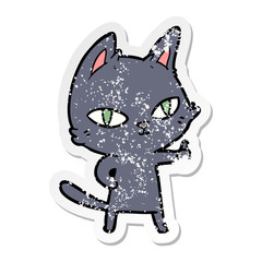 distressed sticker of a cartoon cat staring
